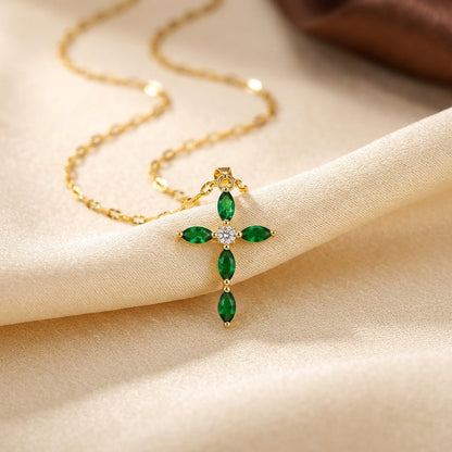 Collar cruz dorado con piedras verdes