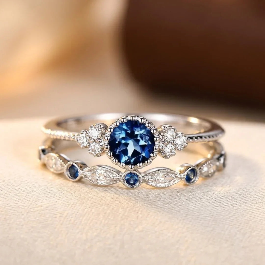 Anillo halo con piedra azul – plateado
